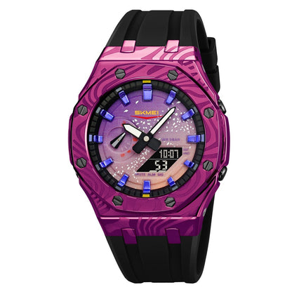 An analog-digital wristwatch with a vibrant purple, pink, and orange gradient dial, featuring a metallic purple octagonal bezel with dark patterned engravings and a black silicone strap.