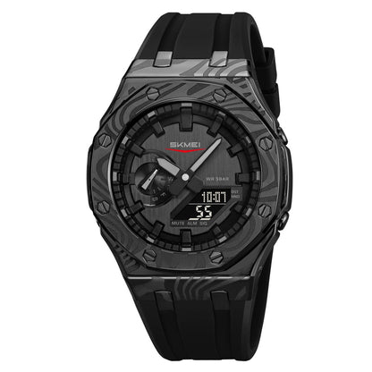A black analog-digital wristwatch with a textured camo-patterned bezel, octagonal case, and black silicone strap.