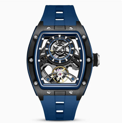A tonneau-shaped skeleton watch featuring a black bezel with silver screws and a vibrant blue rubber strap with a mechanical movement visible on the dial.