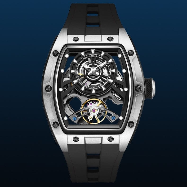 A skeleton watch featuring a tonneau-shaped silver-tone case, a black dial with exposed mechanical movement components, and a black textured rubber strap against a dark blue background.