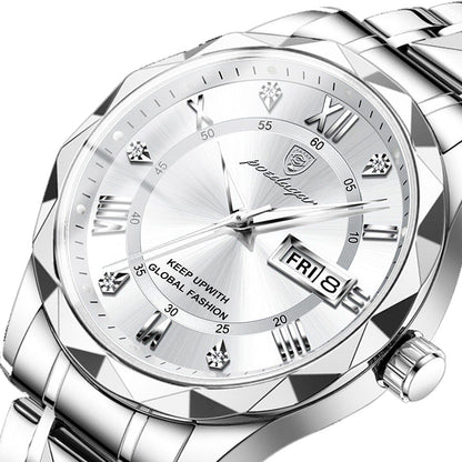A silver-toned analog wristwatch with a metallic link bracelet, featuring a textured geometric bezel and a circular silver dial with diamond-style hour markers and a date window.