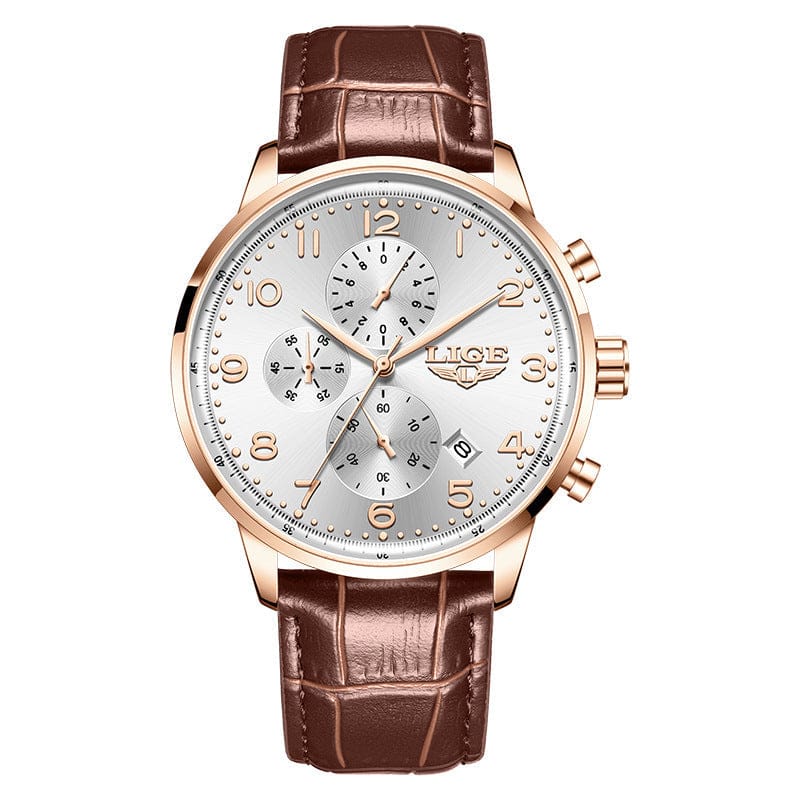 A silver-faced chronograph wristwatch with gold-tone accents, numerical hour markers, and a brown leather crocodile-textured strap.
