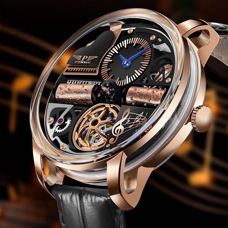 A rose gold wristwatch with a skeletonized dial featuring a musical theme, including a miniature piano, a treble clef, gear mechanisms, and a black leather strap.