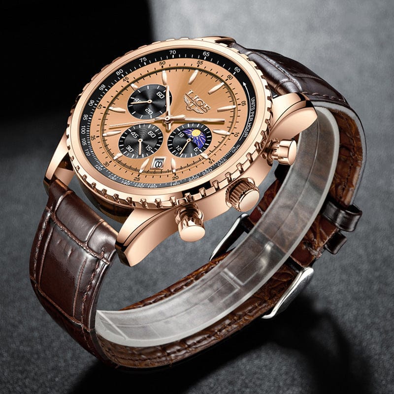 A rose gold chronograph watch with a textured golden face, three sub-dials, and a dark brown crocodile-embossed leather strap displayed on a stand against a dark textured background.