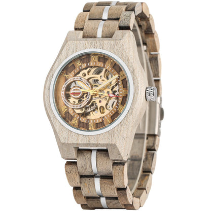 A skeleton wrist watch with a light brown wood grain case and link band accented by thin silver metallic strips featuring gold Roman numeral hour markers on a circular dial.