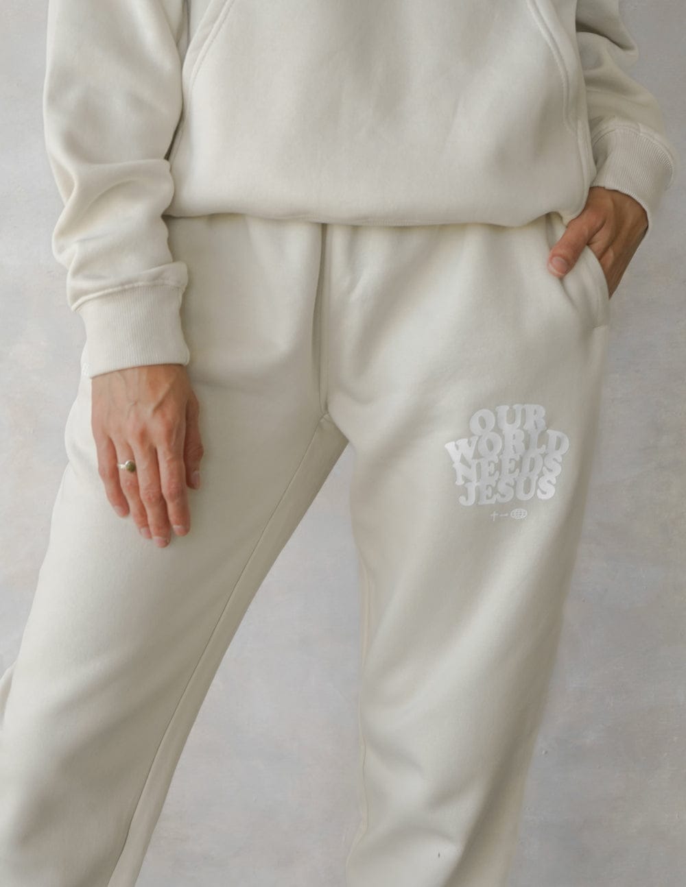 Our World Needs Jesus Beige Unisex Sweatpant - A-1 Thread Vault