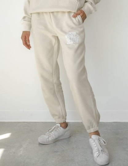 Our World Needs Jesus Beige Unisex Sweatpant - A-1 Thread Vault