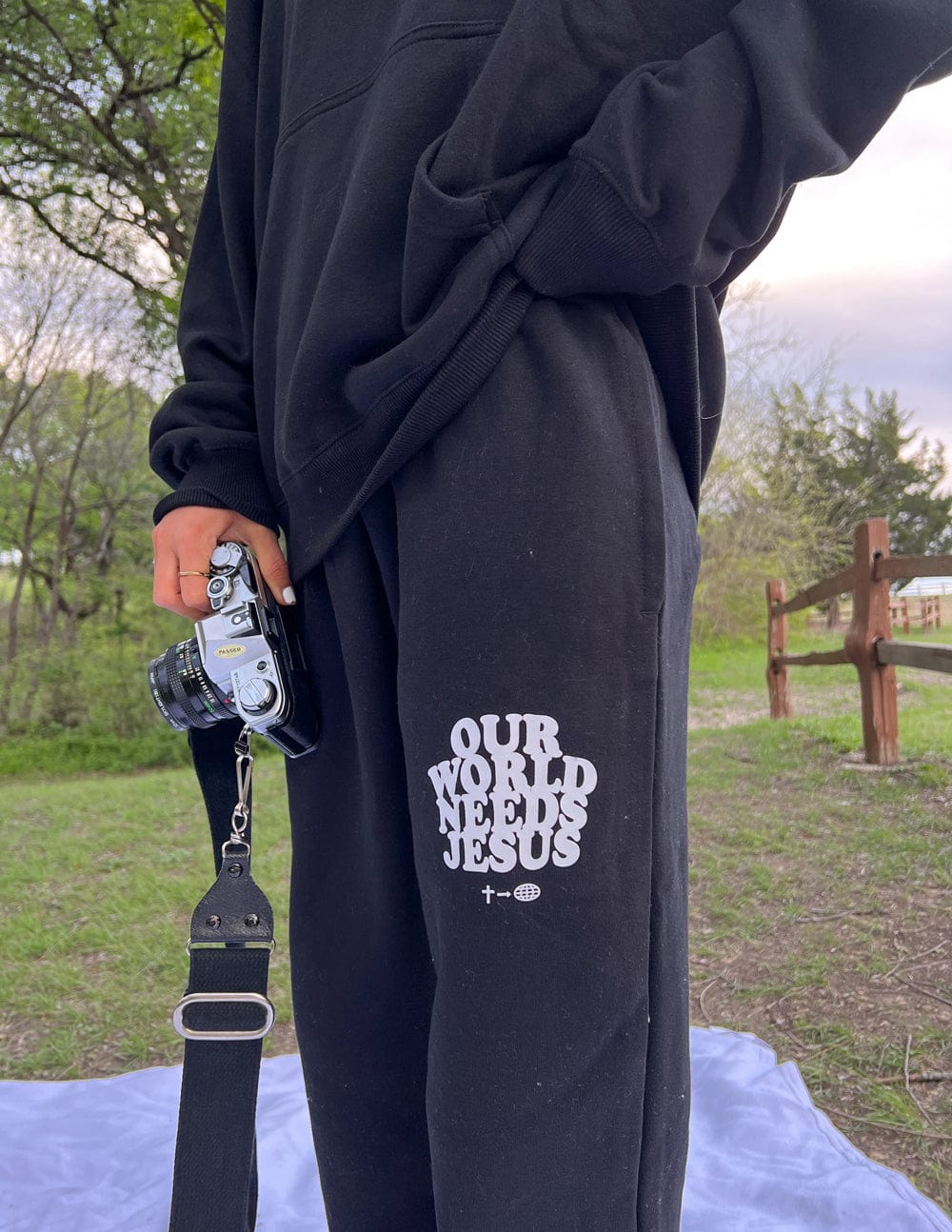 Our World Needs Jesus Black Unisex Sweatpant - A-1 Thread Vault