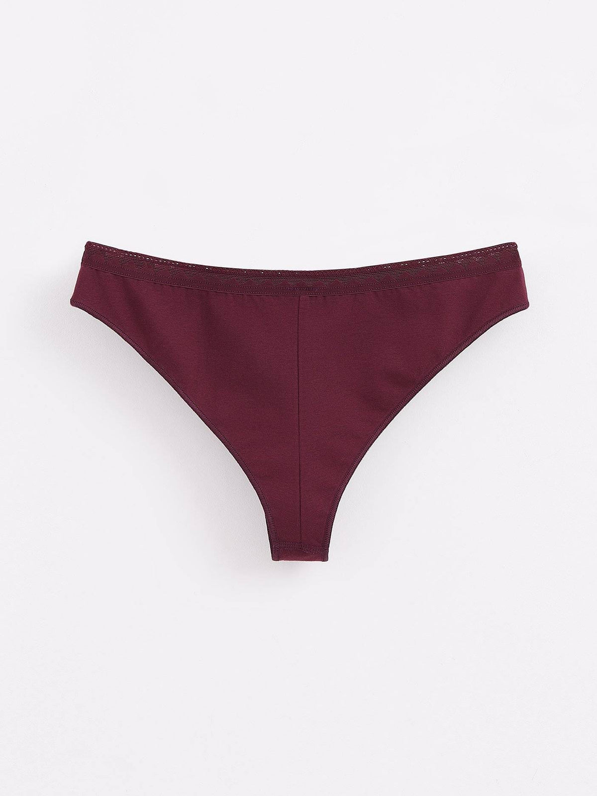 Burgundy thong-style underwear featuring a seamless design and a thin elasticated waistband.