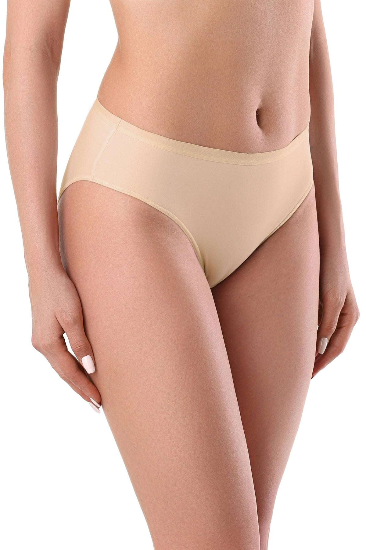 A pair of nude-colored bikini-style panties with a seamless construction worn by a woman.