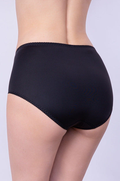 Black full-coverage briefs worn on a person, featuring a smooth fabric finish and delicate scalloped trim along the waistband and leg openings.