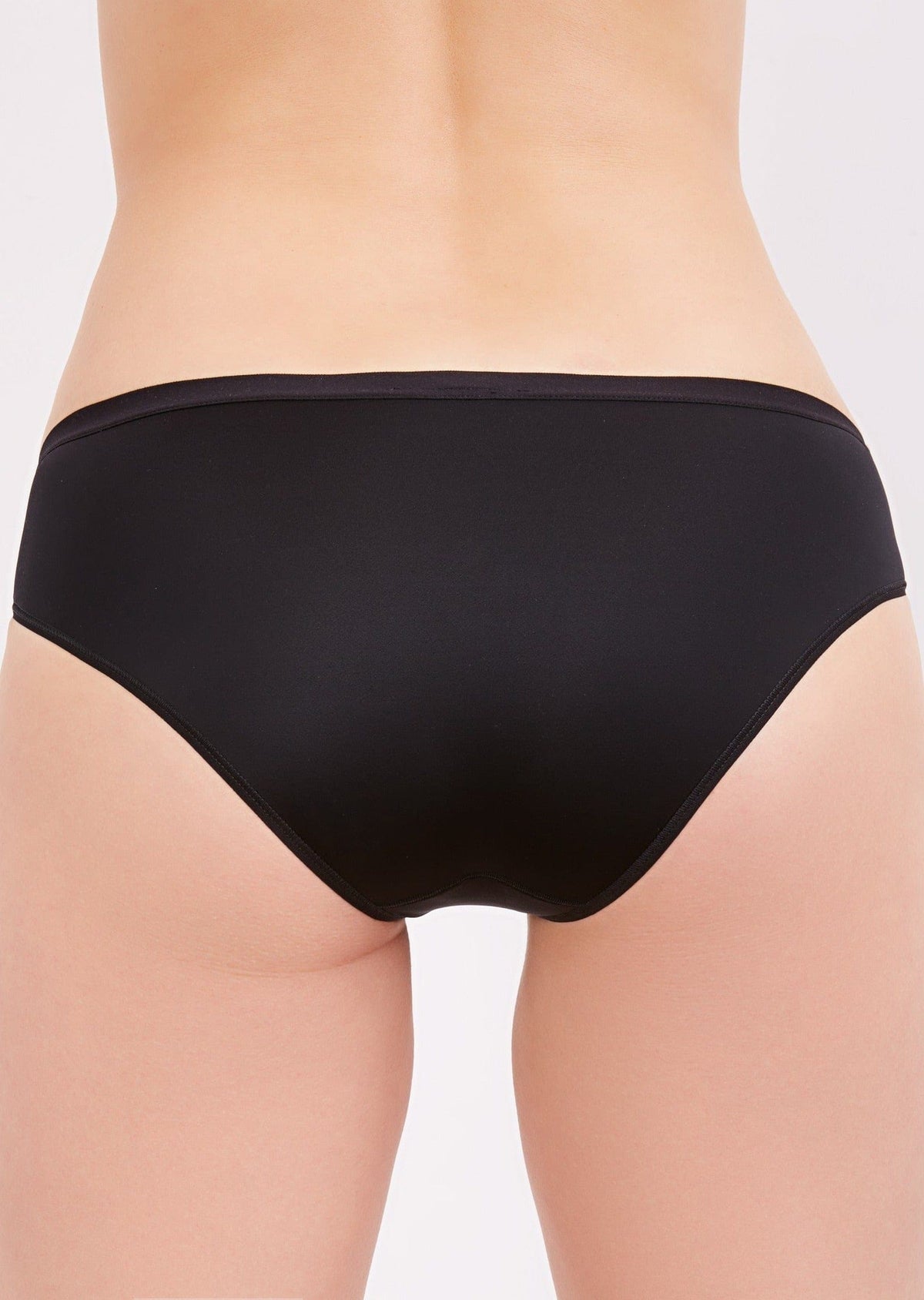 A back view of black bikini-style underwear worn on a person against a white background.