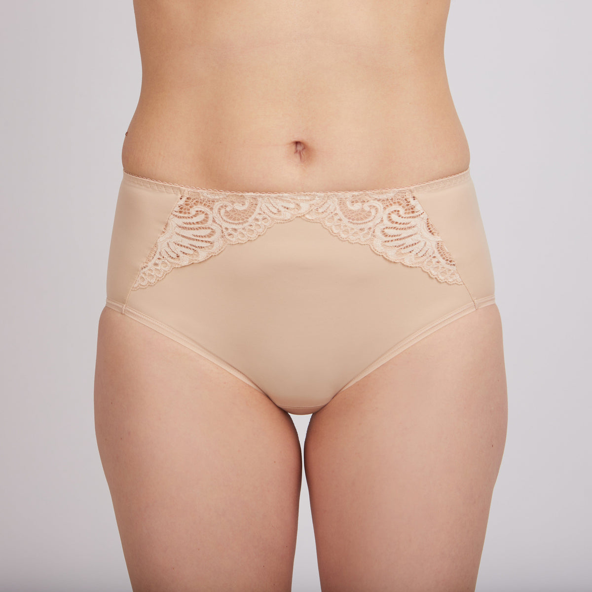 Beige high-waisted briefs with decorative lace detailing along the upper front panel.