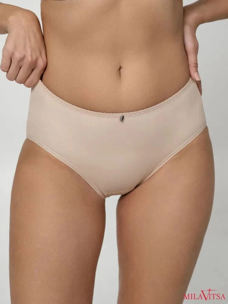 Beige high-cut brief underwear featuring a smooth, seamless finish and a small decorative charm centered on the elasticized waistband.