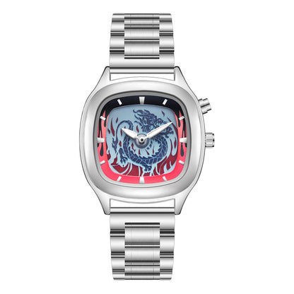A silver-toned stainless steel watch with a rounded square case and a blue dragon motif on a red flame-patterned dial, featuring a metallic link bracelet.