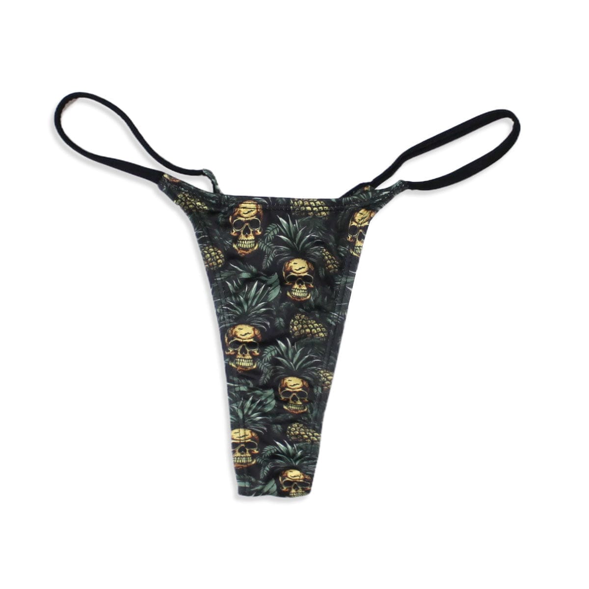 A thong with a black base featuring a repeating pattern of gold skulls nestled within green pineapple leaves and thin black elastic side straps.