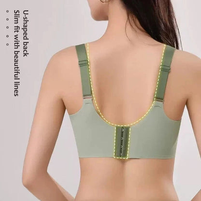 A sage green bra viewed from the back featuring adjustable straps and a U-shaped back design with a central hook-and-eye closure.
