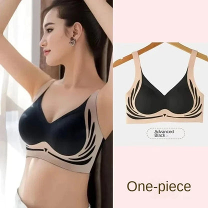 A woman wearing a two-tone wireless bra featuring a black cup area with decorative black leaf patterns against a beige background, displayed alongside a flat view labeled Advanced Black and the text One-piece.