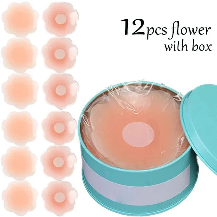 Twelve flower-shaped, nude-colored adhesive nipple covers are displayed next to a teal circular tin container filled with the covers.