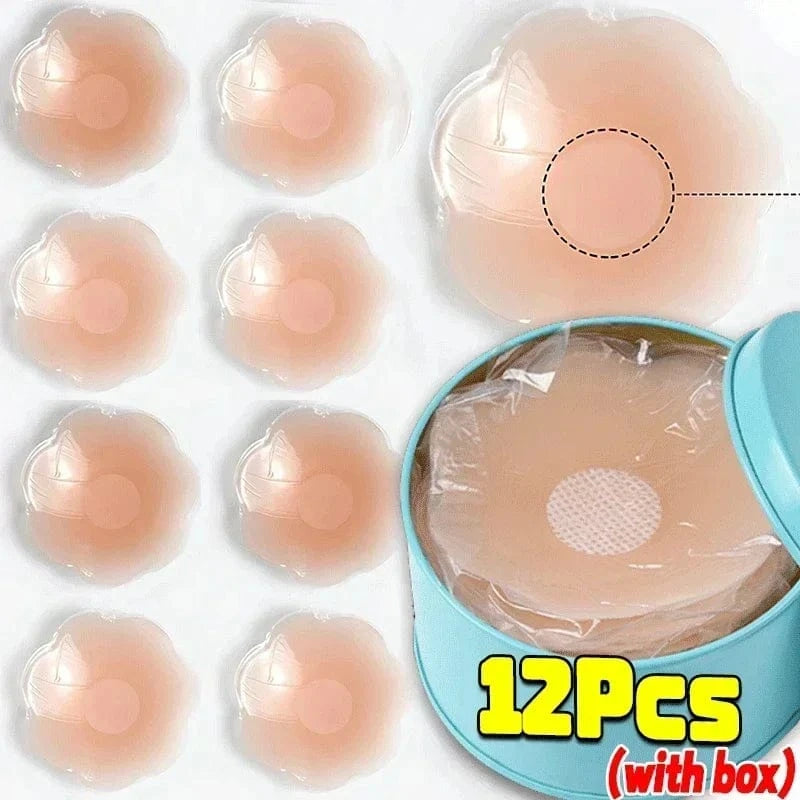 Twelve light beige adhesive nipple covers with a flower-like petal design, displayed next to a teal storage tin containing the covers.