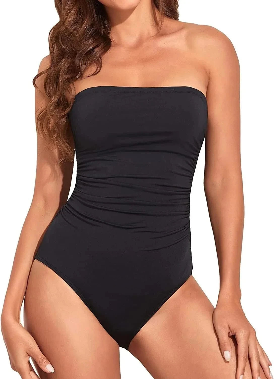 A strapless one-piece swimsuit in solid black with ruched detailing along the sides of the torso.