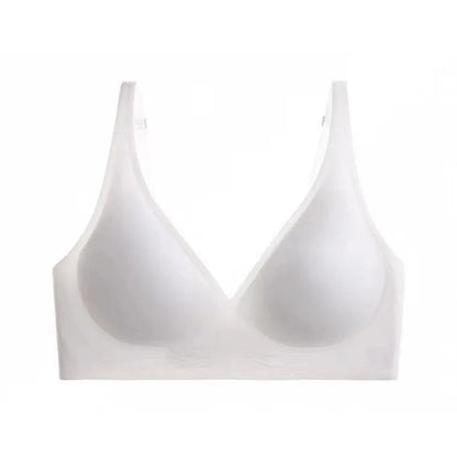 A white seamless bra with molded cups and wide shoulder straps on a plain white background.