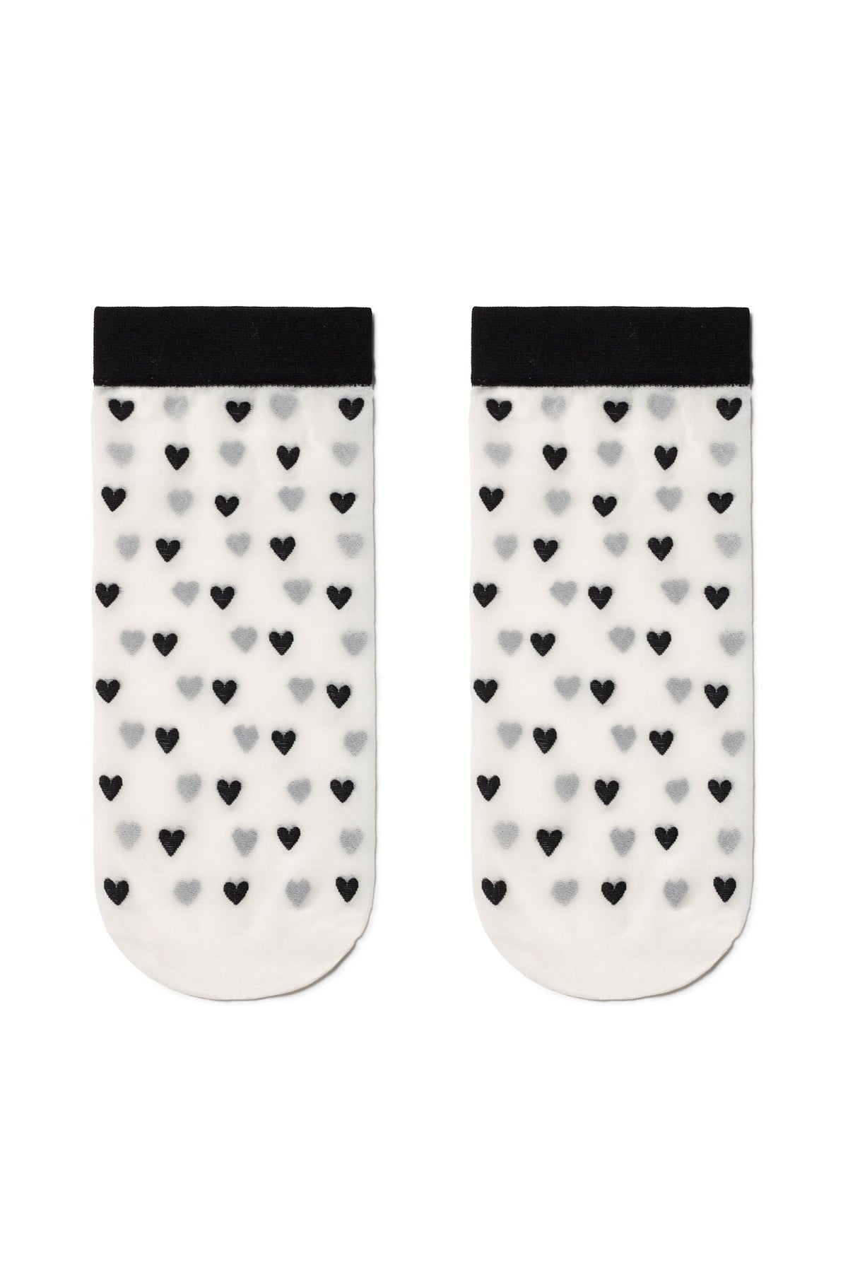 A pair of white sheer ankle socks featuring a repeating pattern of small black and grey hearts with a solid black trim at the cuffs.