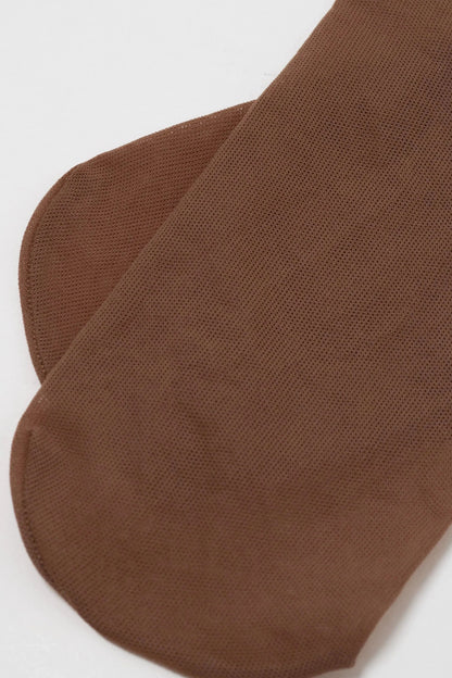 A pair of sheer brown hosiery socks laid flat against a plain white background.