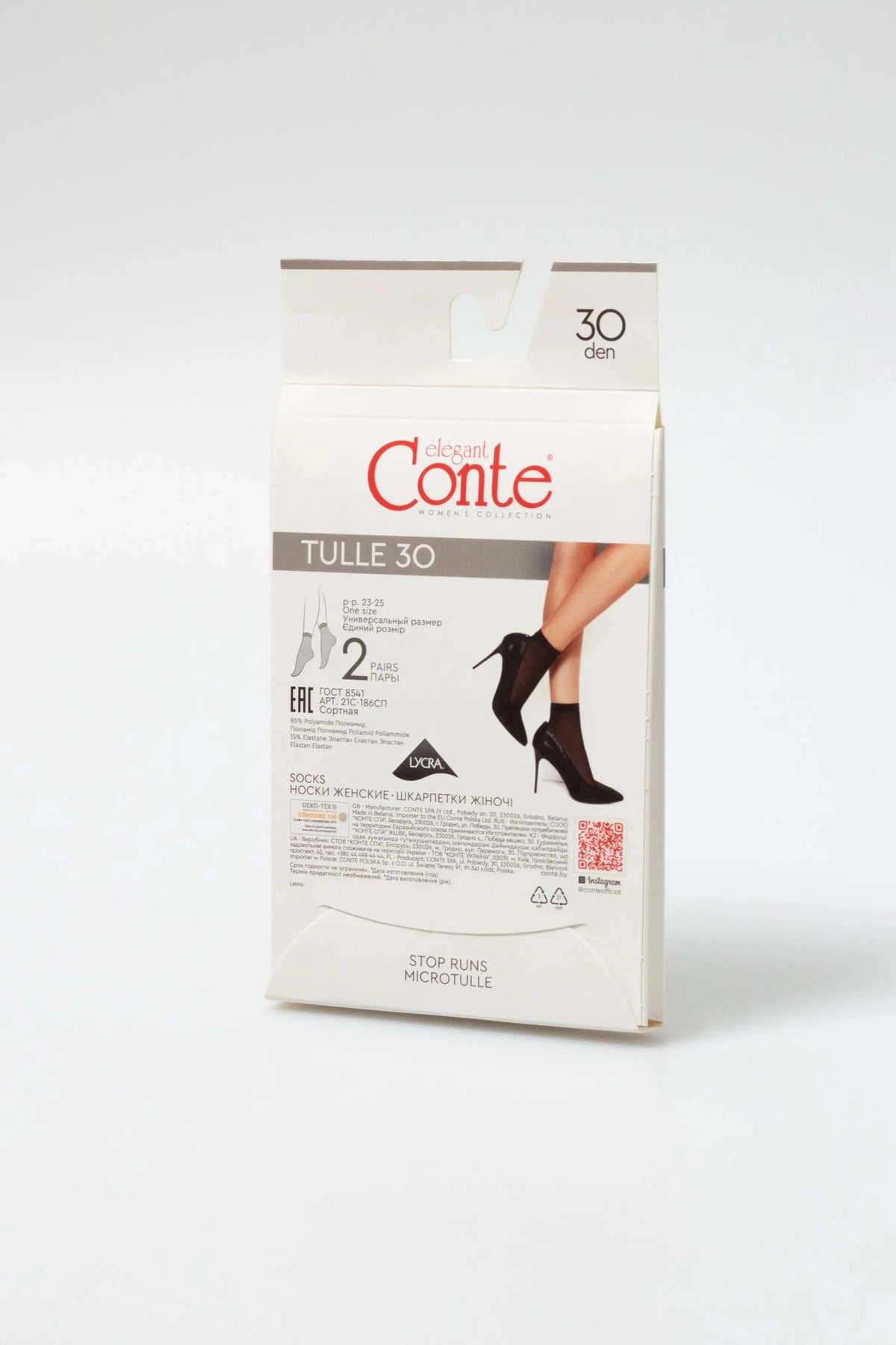 A box of sheer black socks for women is displayed against a plain background, featuring an illustration of legs wearing the socks with black high heels.