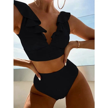 A black two-piece bikini featuring a high-waisted bottom and a cropped top with ruffled shoulder straps.