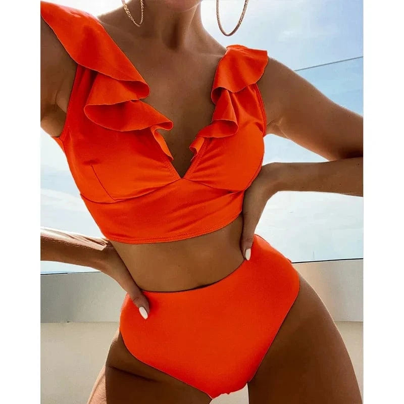 A bright orange two-piece bikini featuring a ruffled V-neck crop top and matching high-waisted bottoms.