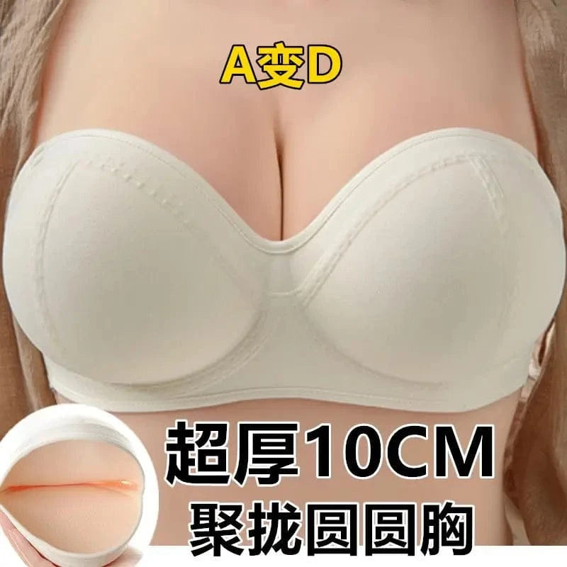 A strapless, beige-colored push-up bra is shown from the front, featuring thick, rounded cups and a small inset image showing the interior padding.