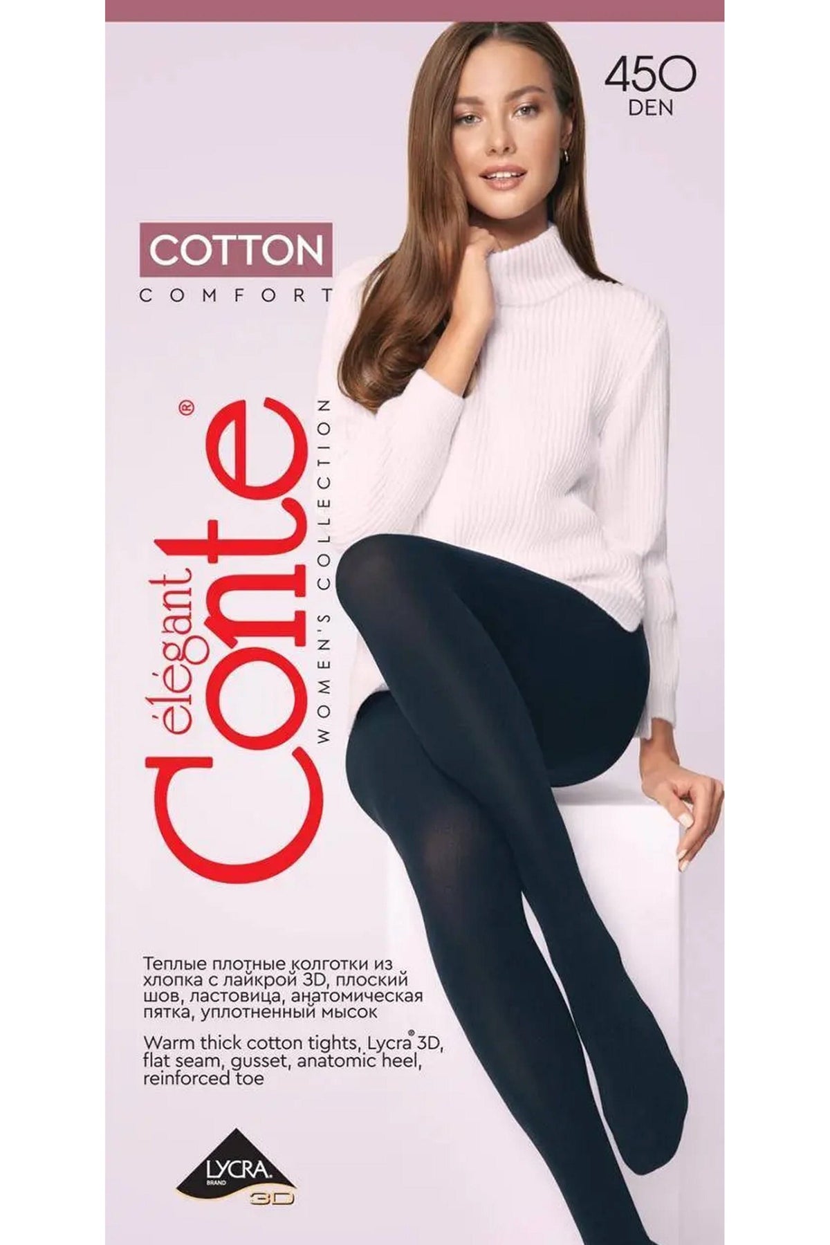 A woman sits wearing solid black opaque tights that feature a reinforced toe and heel, presented in product packaging that highlights the cotton blend material.
