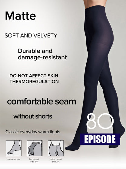 Black opaque tights worn by a model against a light grey background, featuring text detailing product features like a reinforced toe, a gusset, and a matte finish.