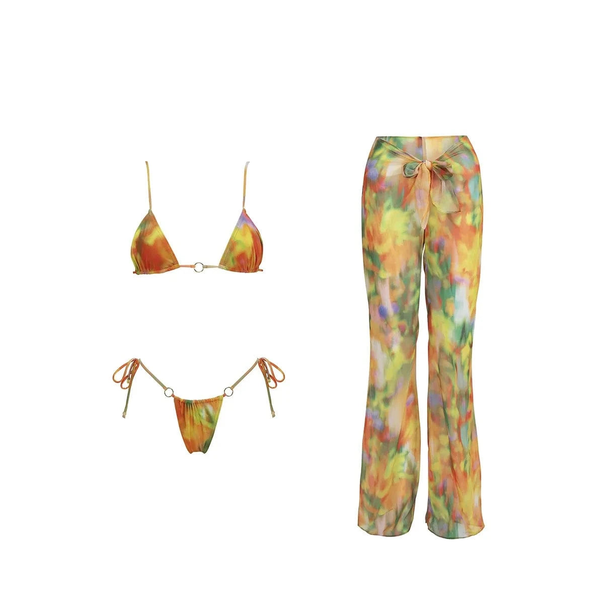 A bikini set consisting of a triangle top and string bottoms alongside matching sheer, high-waisted wide-leg trousers, all featuring a multi-colored abstract watercolor print in shades of orange, yellow, green, and purple.