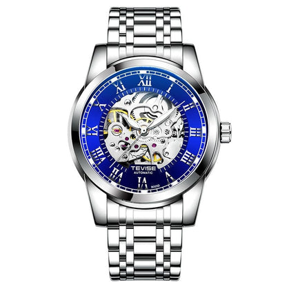 A silver-toned stainless steel automatic watch with a round blue dial featuring a skeletonized center and Roman numeral hour markers on a metal link bracelet.