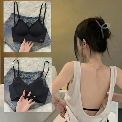 A black wireless bralette with adjustable straps shown from the front and back, displayed alongside a person wearing the bra under a backless white tank top.