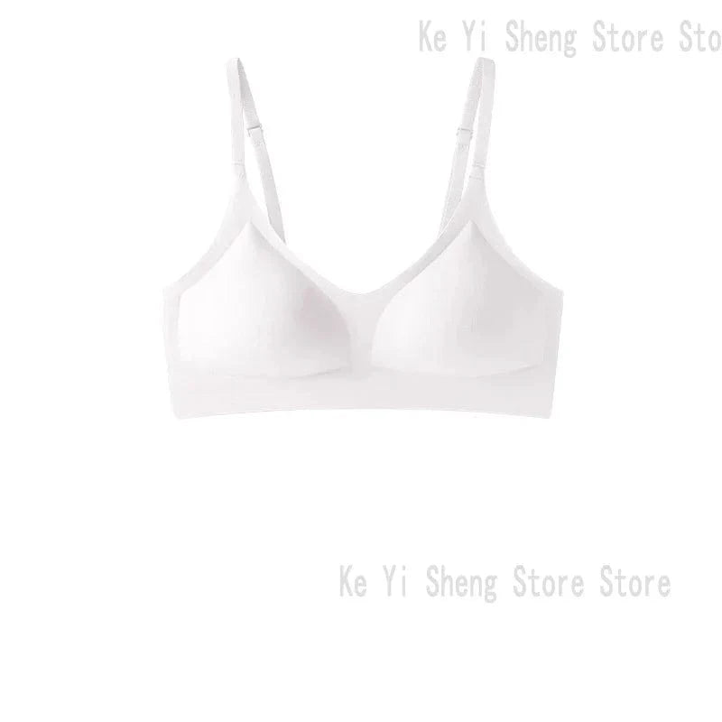 A white wireless bralette with triangle-shaped cups and adjustable spaghetti straps on a plain white background.