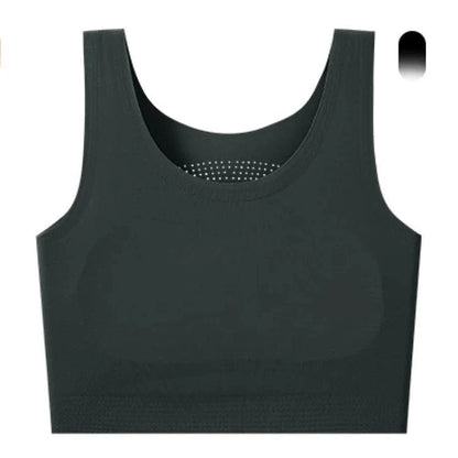 A dark grey seamless sports bra with a rounded neckline and a subtle perforated detail on the upper chest area.