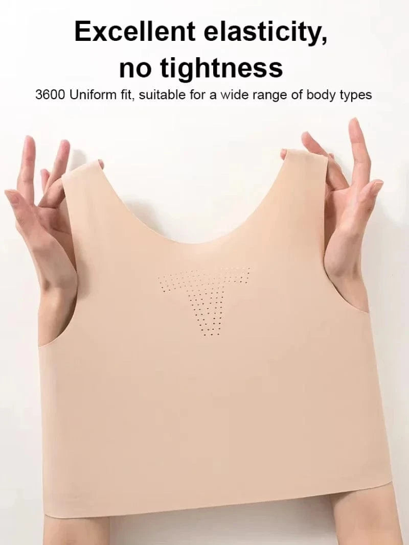A beige seamless tank top is being held up and stretched by a person's hands against a white background.