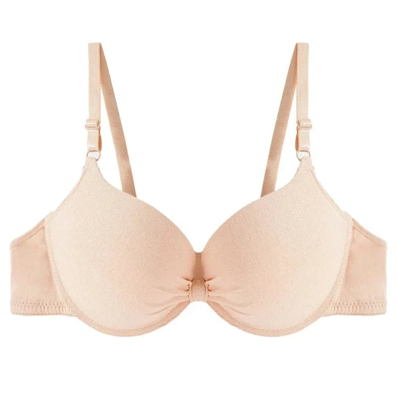 A beige underwire bra with molded cups and adjustable shoulder straps featuring a small gathered detail at the center bridge.