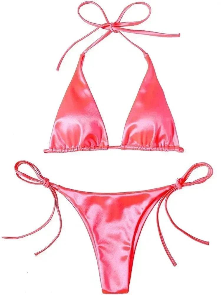 A vibrant pink two-piece bikini set featuring a classic triangle top and matching side-tie bikini bottoms, both designed with adjustable string ties against a plain white background.